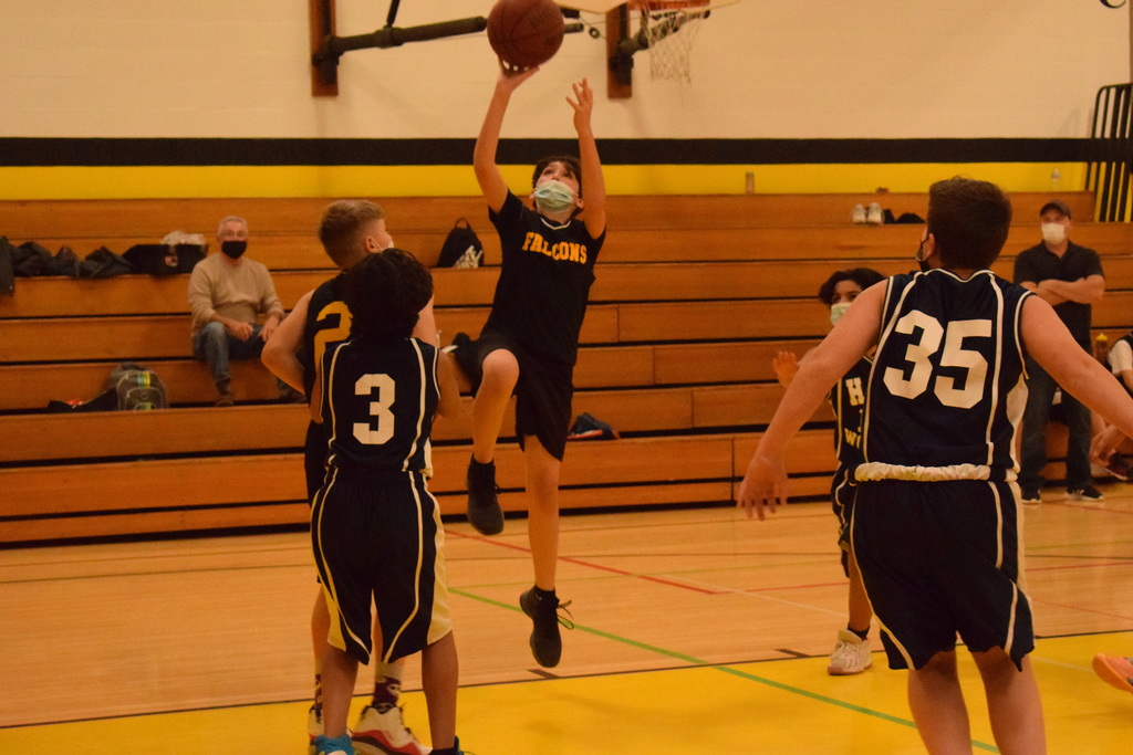 Zack Dawson goes in for a lay up.